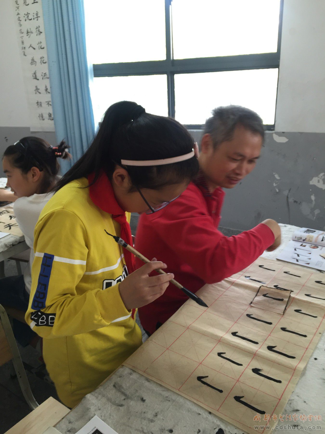 成都市书协青少年书法工作部文化惠民走进金堂县韩滩慈济小学 - 协会动态 - 成都市书法家协会