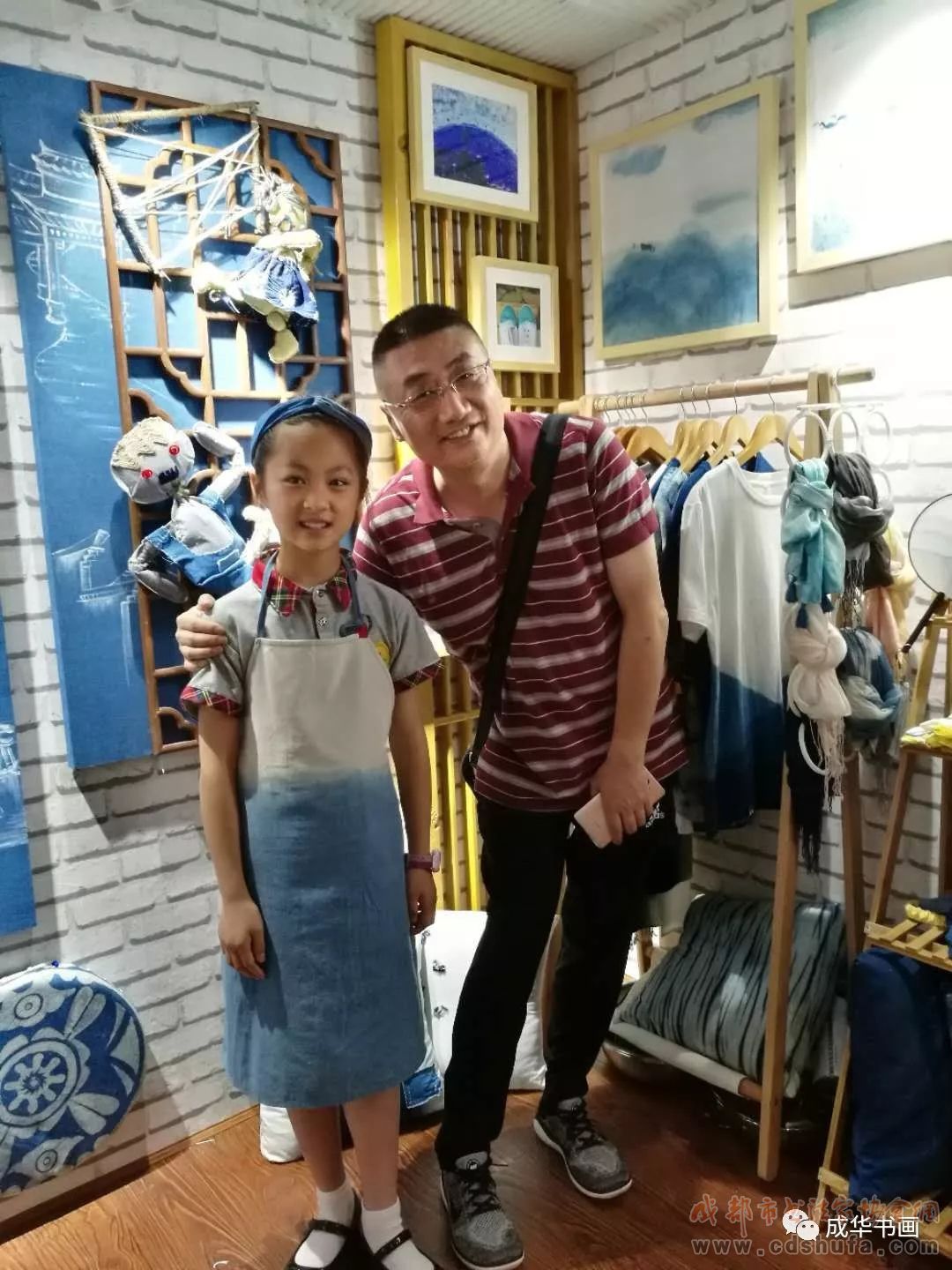 成华区书协组织区美术教师及会员参观成都市第十二届中小学生艺术节
